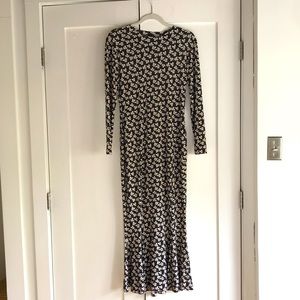 Black fishtail dress with leaf floral print